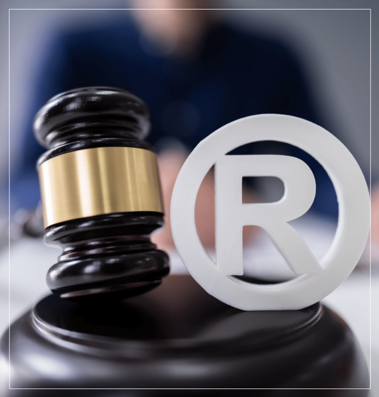 Law gavel next to registered trademark symbol trade protection