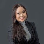 Jessica Chan - Attorney at Hayes Hunter P.C. wearing charcoal suit with grey turtleneck