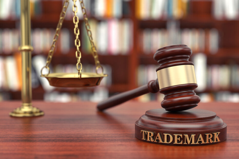 Trademark law scales of justice with gavel