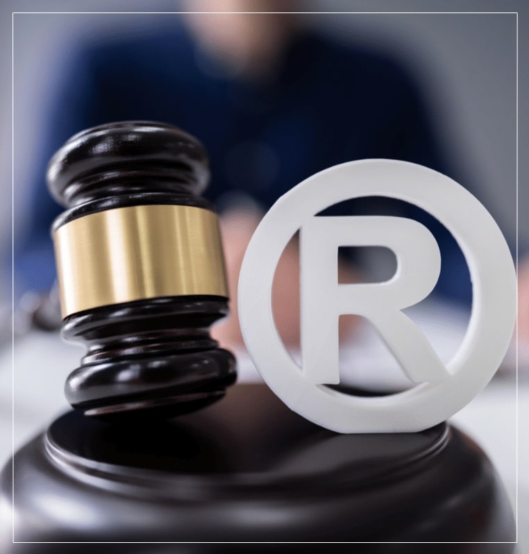 Registered trademark graphic Law gavel next to registered trademark symbol trade protection